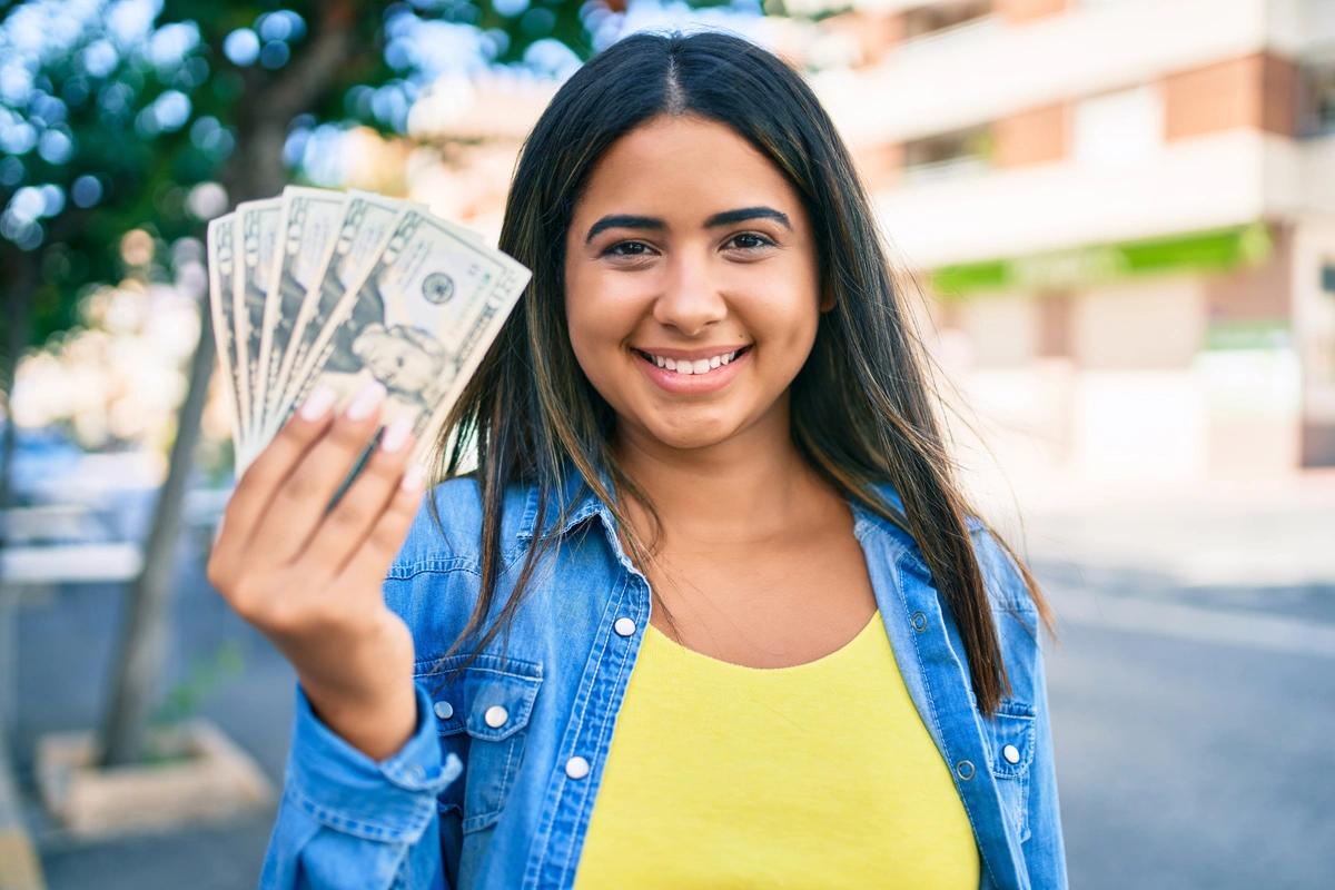young woman with money